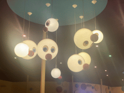 Lamps hanging from the ceiling at the waiting line for the Carnaval Festival attraction at the Reizenrijk kingdom