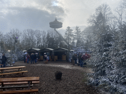 Stalls and tables at the Warme Winter Weide square and the Pagode attraction at the Reizenrijk kingdom, during the Winter Efteling