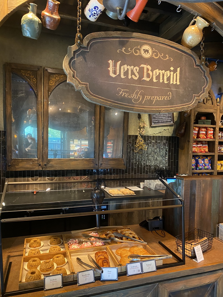 Interior of the In Den Swarte Kat supermarket at the Pirañaplein square at the Anderrijk kingdom