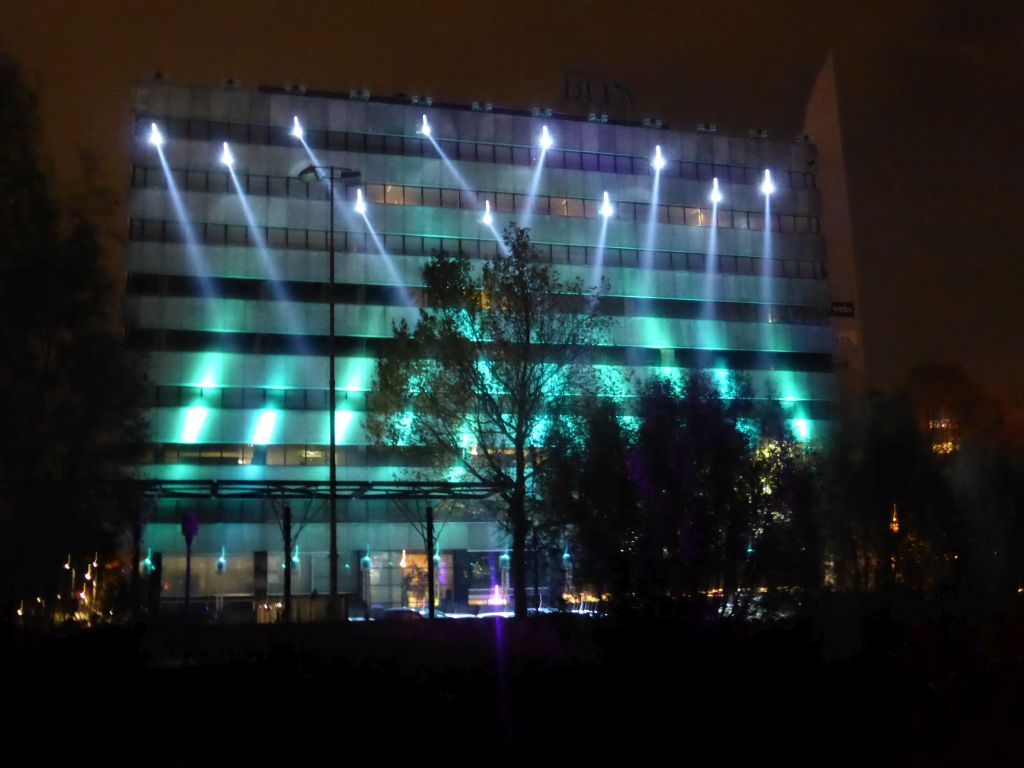 Light sculpture `Statemachine` on the DELA building during the GLOW festival, viewed from the Bleekweg street, by night