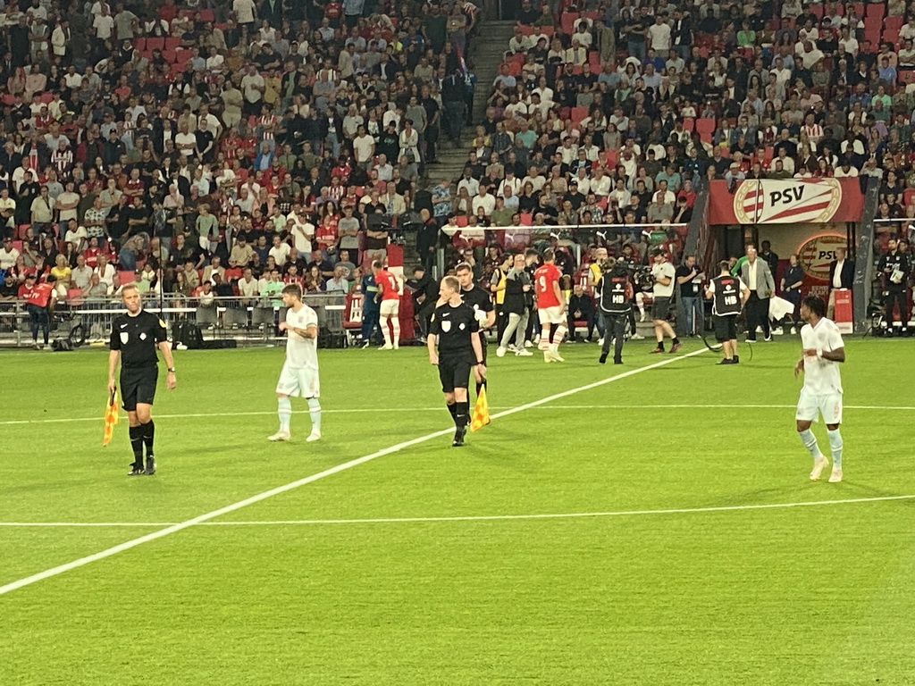 PSV captain Luuk de Jong receiving an award for 250 matches for PSV on the pitch at the Philips Stadium, viewed from the Eretribune Noord grandstand, just before the football match PSV - NEC