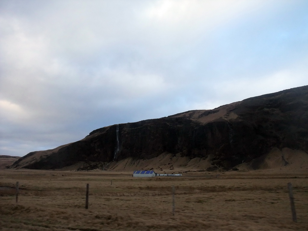 Waterfall on the southwest side of the Eyjafjallajökull volcano, viewed from the rental car to Reykjavik