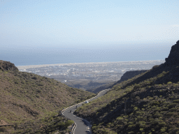 The GC-60 road and the town of Maspalomas with the Maspalomas Dunes, viewed from the Mirador Astronómico de la Degollada de las Yeguas viewpoint