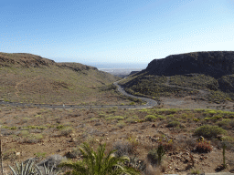 The GC-60 road and the town of Maspalomas with the Maspalomas Dunes, viewed from the Mirador Astronómico de la Degollada de las Yeguas viewpoint