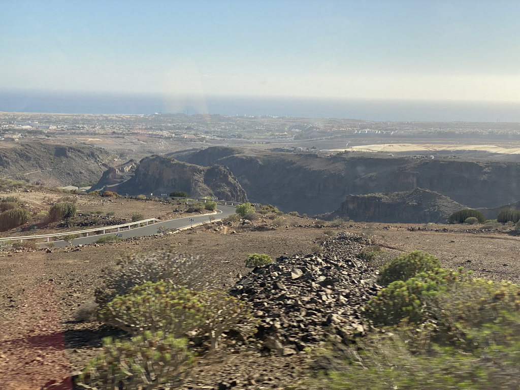 The town of Maspalomas and the south side of the Barranco de Fataga ravine, viewed from the tour bus on the GC-60 road