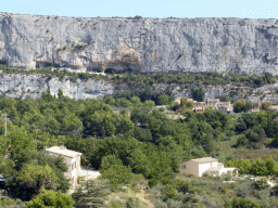 Cliff at the east side of the town of Lioux, viewed from the D60A road from Sault