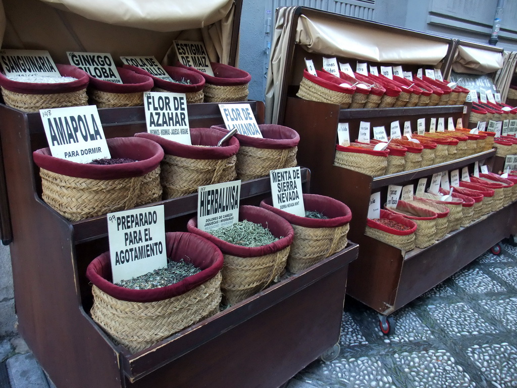 Street stalls with herbs at the Calle de la Cárcel Baja street