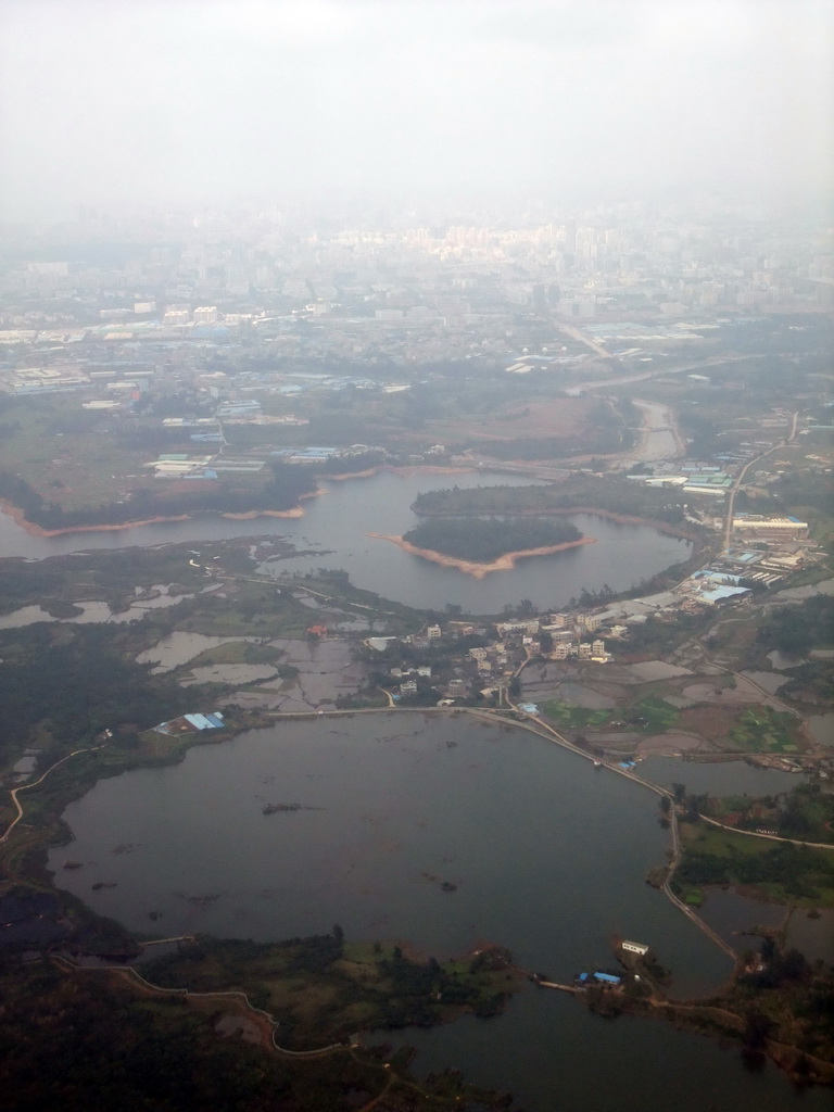 Skyline of Haikou and lakes to the south of the city, viewed from the airplane from Zhengzhou