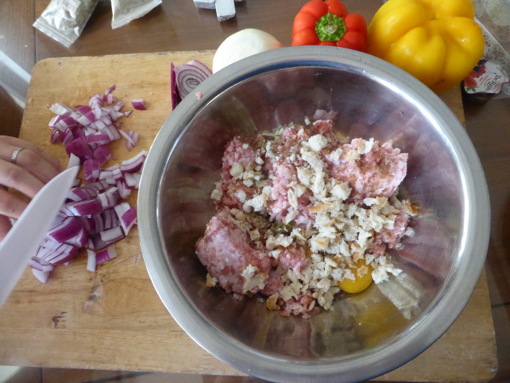 Meatballs being prepared in the apartment of Miaomiao`s sister