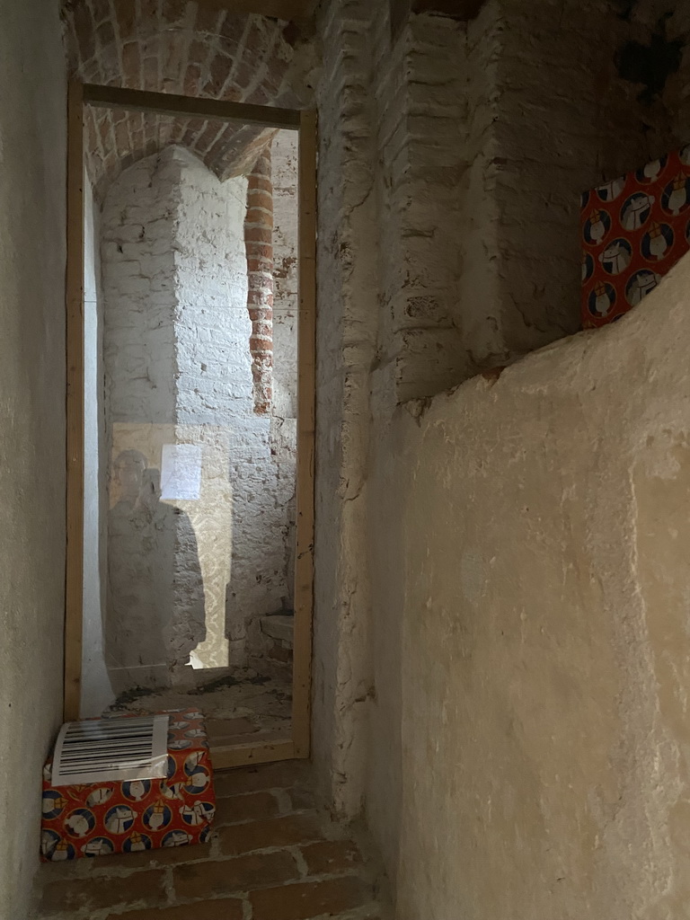 Presents at a closed staircase to the roof at the second floor of the main building of the Heeswijk Castle, during the `Sint op het Kasteel 2022` event