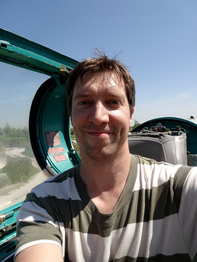 Tim in the cockpit of the MIG-21M airplane at the HistoryLand museum