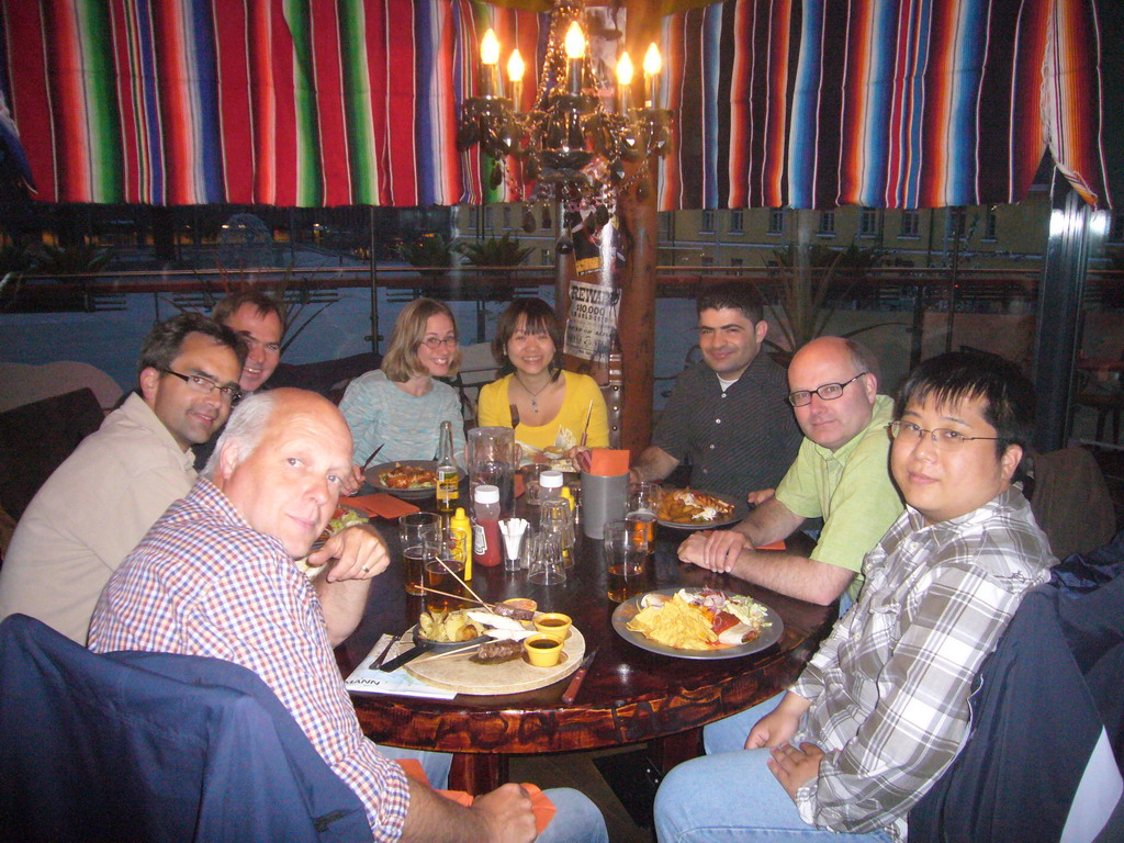 Miaomiao and her colleagues having dinner in a restaurant at the city center