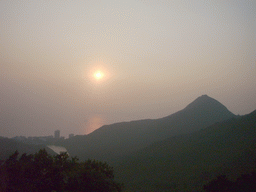 The west side of Hong Kong Island with Mount Davis, viewed from Victoria Peak, at sunset