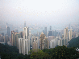 The skyline of Hong Kong and Kowloon with the International Commerce Centre, under construction, the Two International Finance Centre, the Bank of China Tower and the Central Plaza building, and Victoria Harbour, viewed from Victoria Peak, at sunset