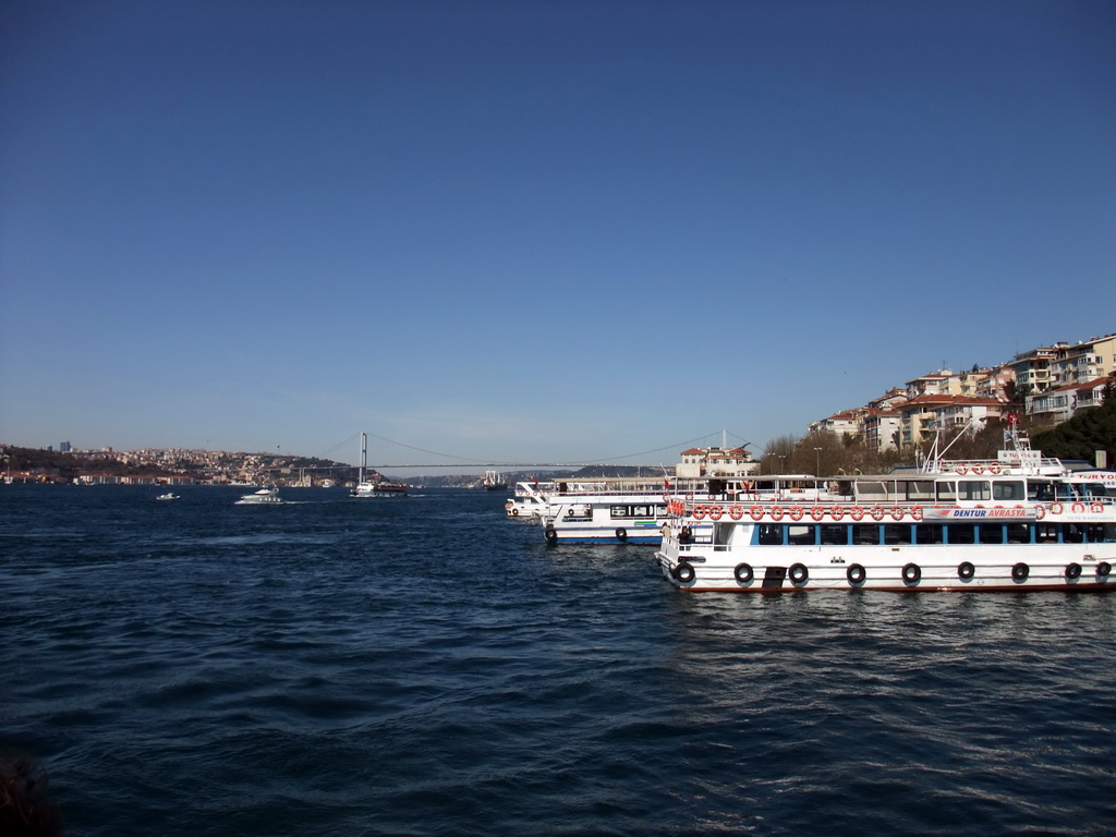 The Bosphorus Bridge and boats in the Bosphorus strait, viewed from the Bosphorus ferry