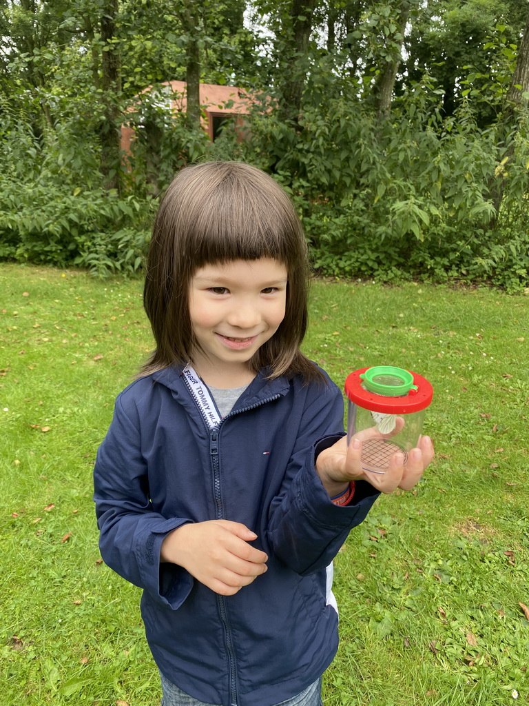 Max with a moth at the Lindenhof garden at the Zeeuwse Oase garden