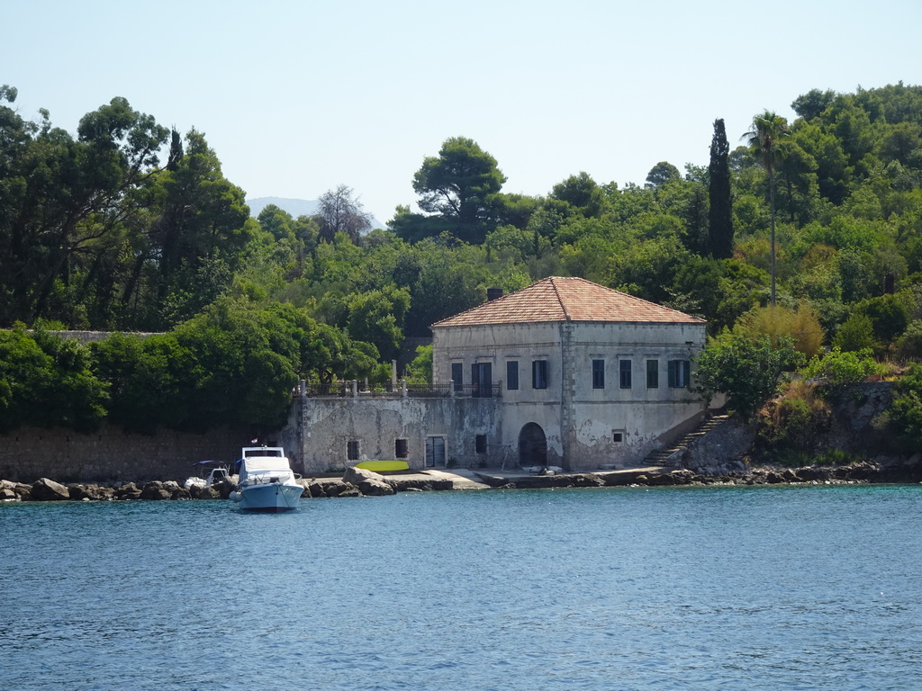 House and boat on the east side of Kolocep Bay, viewed from the Elaphiti Islands tour boat