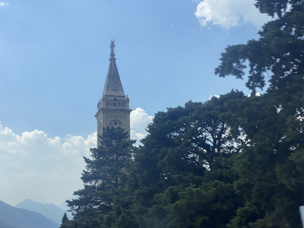 The tower of the Church of Saint Eustahije at the town of Dobrota, viewed from the tour bus on the E65 road