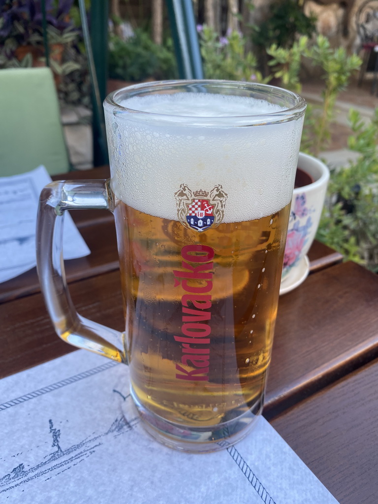 Karlovacko beer on the terrace of the Restaurant Konavoka