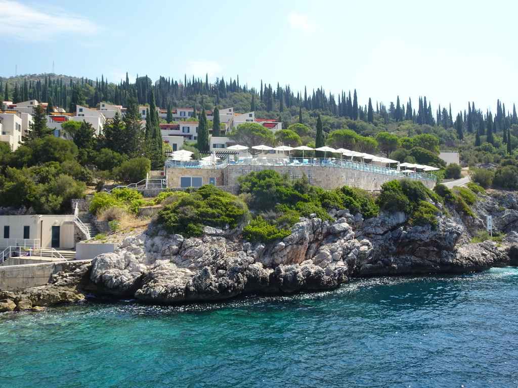 Swimming pool of the Sun Gardens Dubrovnik hotel, viewed from the Elaphiti Islands tour boat