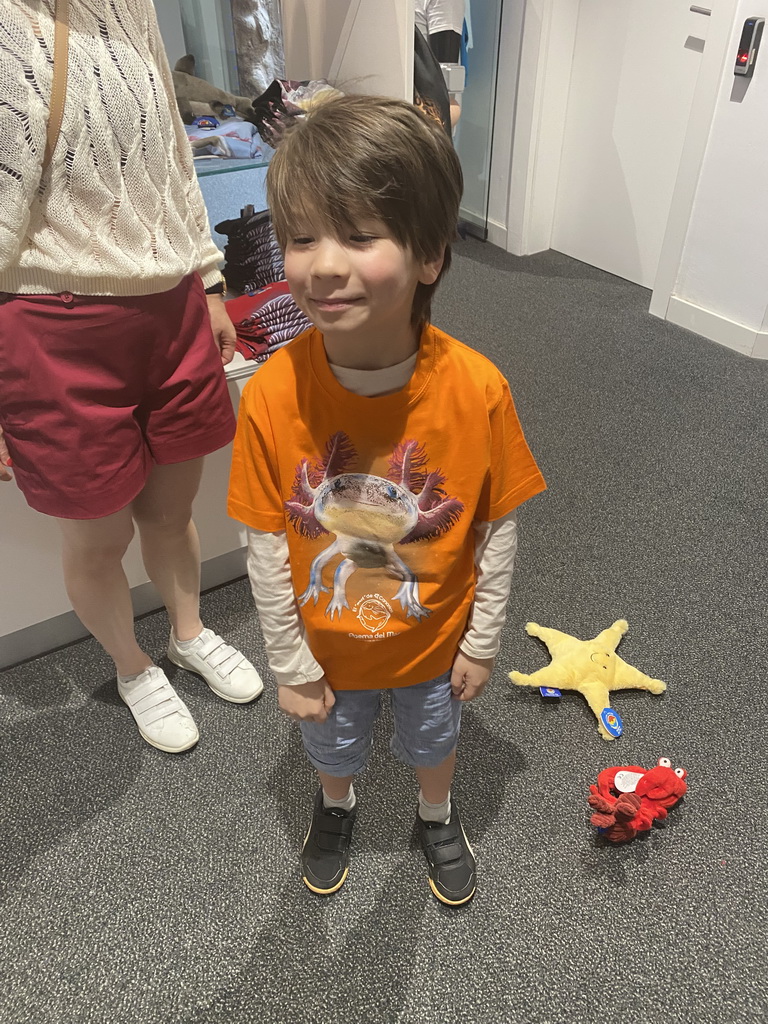 Max with an Axolotl shirt at the Souvenir Shop at the Poema del Mar Aquarium