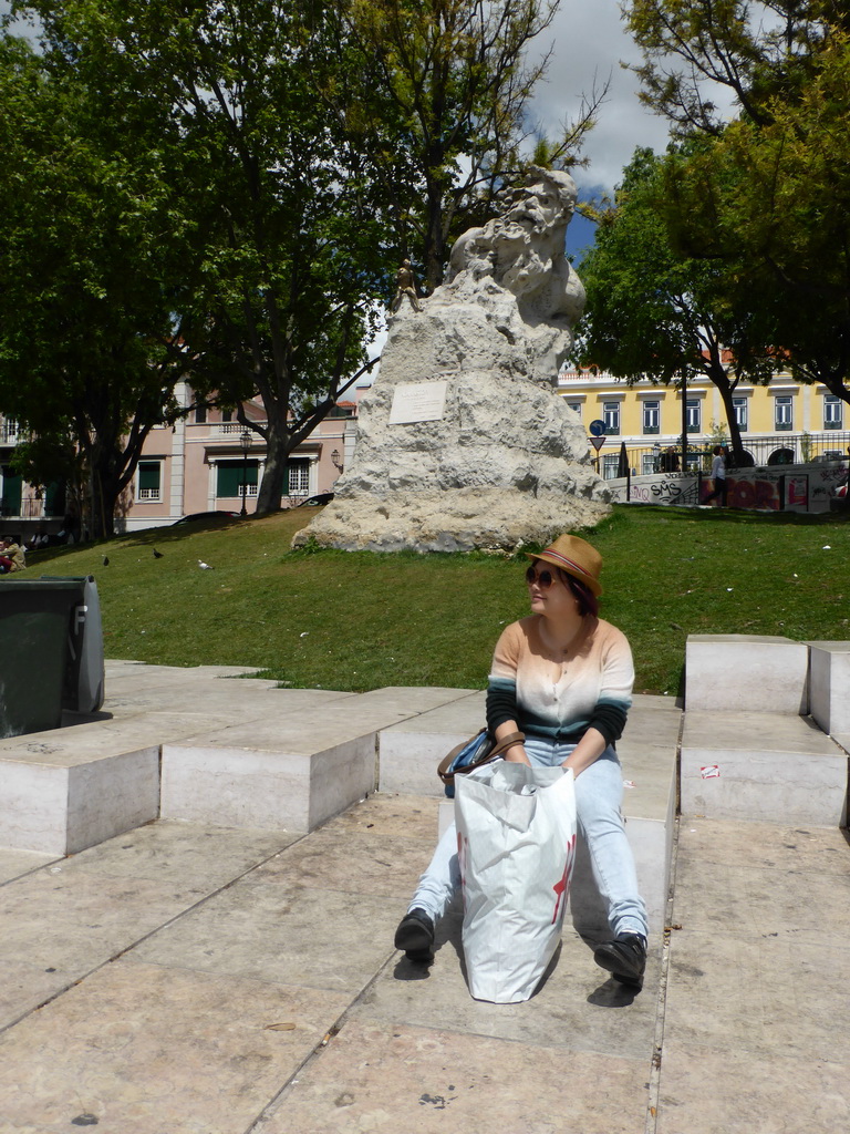 Miaomiao in front of the statue of Adamastor at the Miradouro da Santa Catarina viewpoint