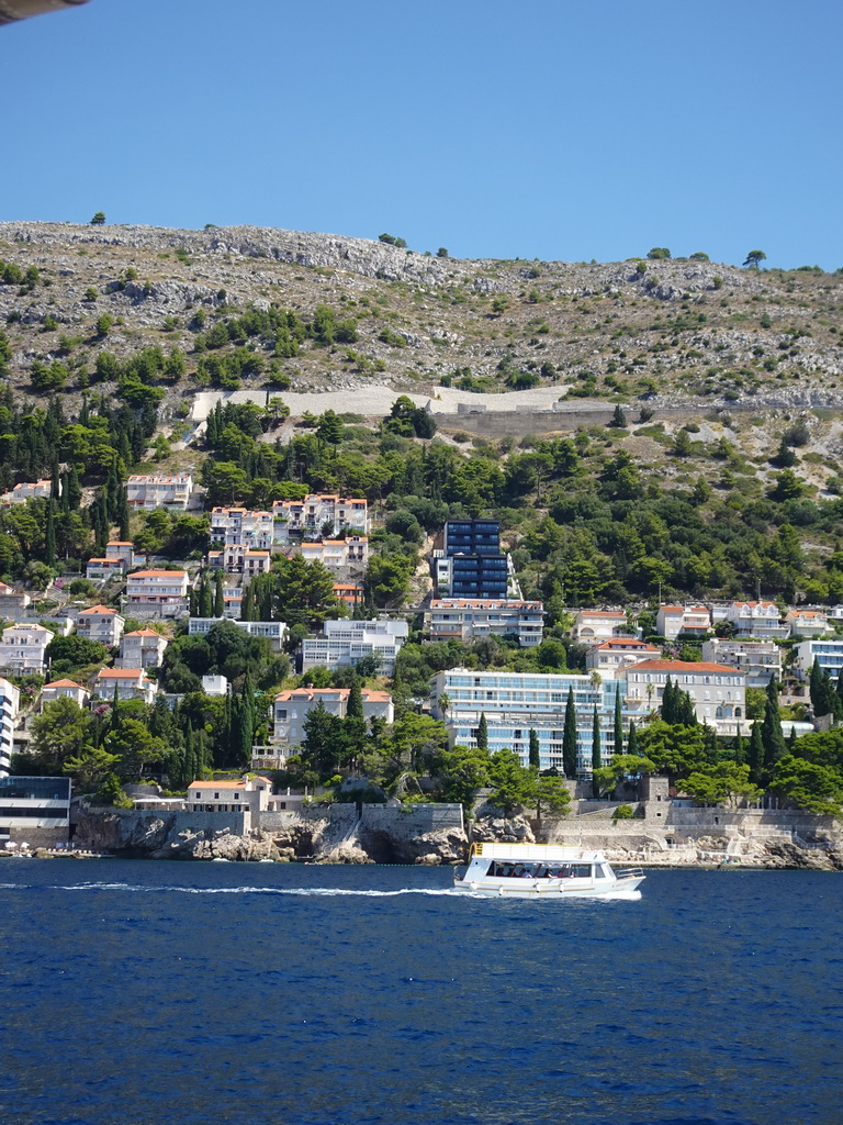 Boat in front of the east side of Dubrovnik, viewed from the ferry from Dubrovnik Harbour