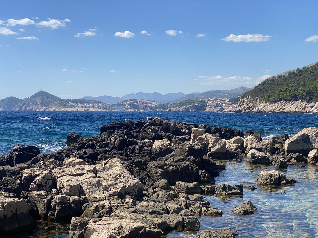 The Lokrum Main Beach and the west side of Dubrovnik with the Rixos Premium Dubrovnik hotel and Fort Lovrijenac