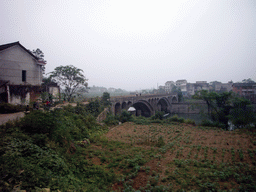 Bridge over river in Miaomiao`s grandparents` village