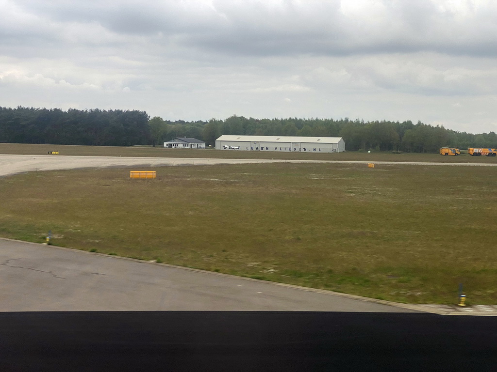 Airplane hangar at Eindhoven Airport, viewed from the airplane from Eindhoven