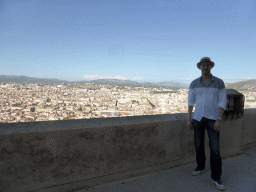 Tim at the northeast side of the square around the Notre-Dame de la Garde basilica, with a view on the city center