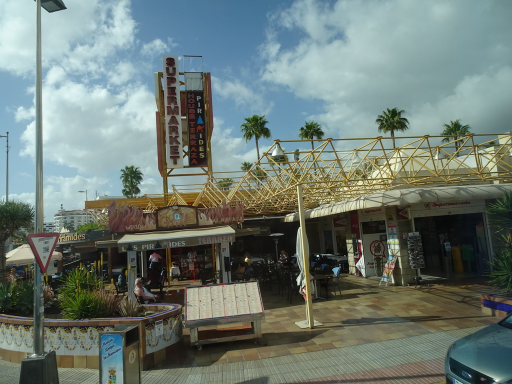 Front of the Centro Comercial Plaza Maspalomas shopping mall at the Avenida de Gran Canaria street, viewed from the shuttle bus from the Gran Canaria Airport