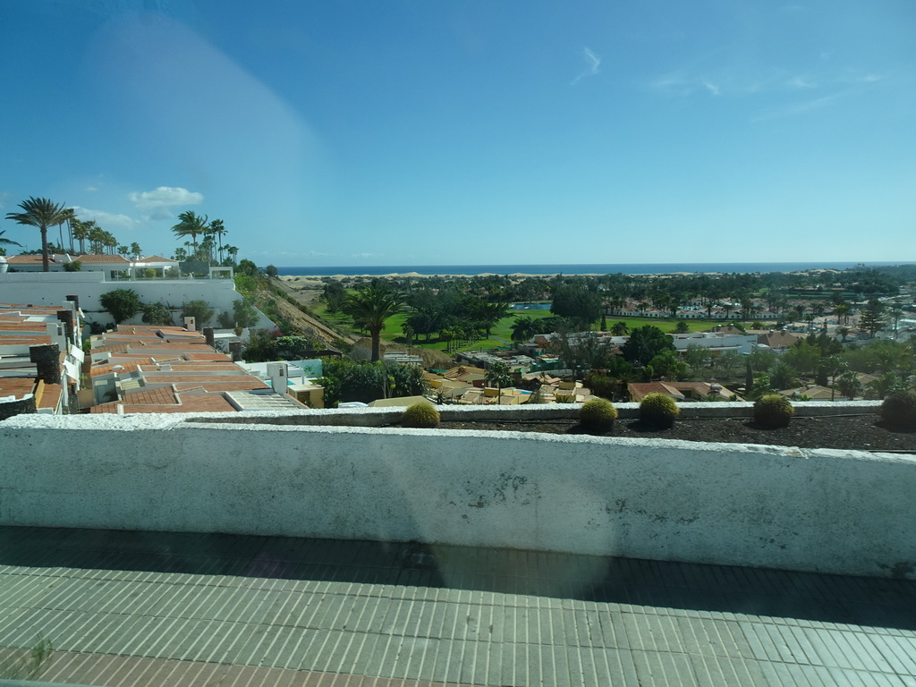 The Maspalomas Golf Course and the Maspalomas Dunes, viewed fom the tour bus from Puerto Rico on the Avenida Touroperador Tui street