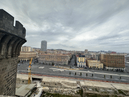 Northwest side of the roof of the Castel Nuovo castle with the Tower of San Giorgio, ruins at the Piazza Municipio square and the city center with the Hotel NH Napoli Panorama