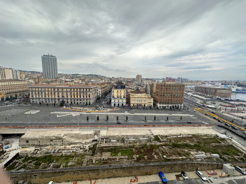 Ruins at the Piazza Municipio square, the Naples Port and the city center with the Hotel NH Napoli Panorama, viewed from the north side of the roof of the Castel Nuovo castle