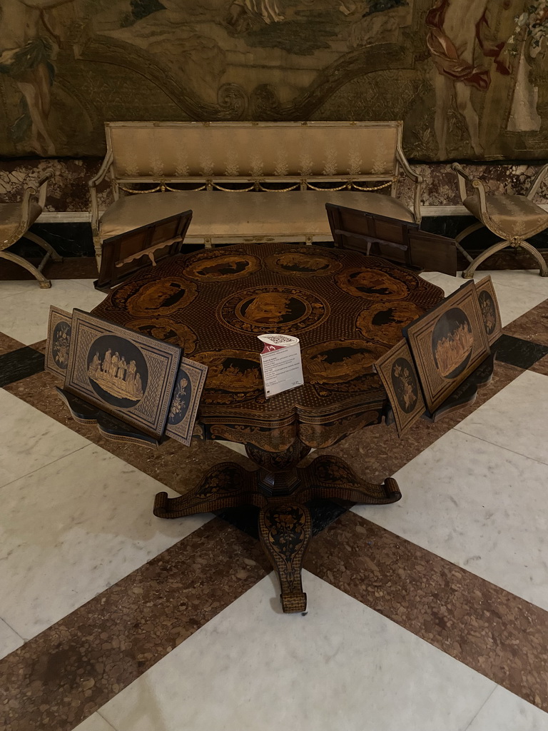 Music table at the Great Captain`s Hall at the Royal Palace of Naples, with explanation