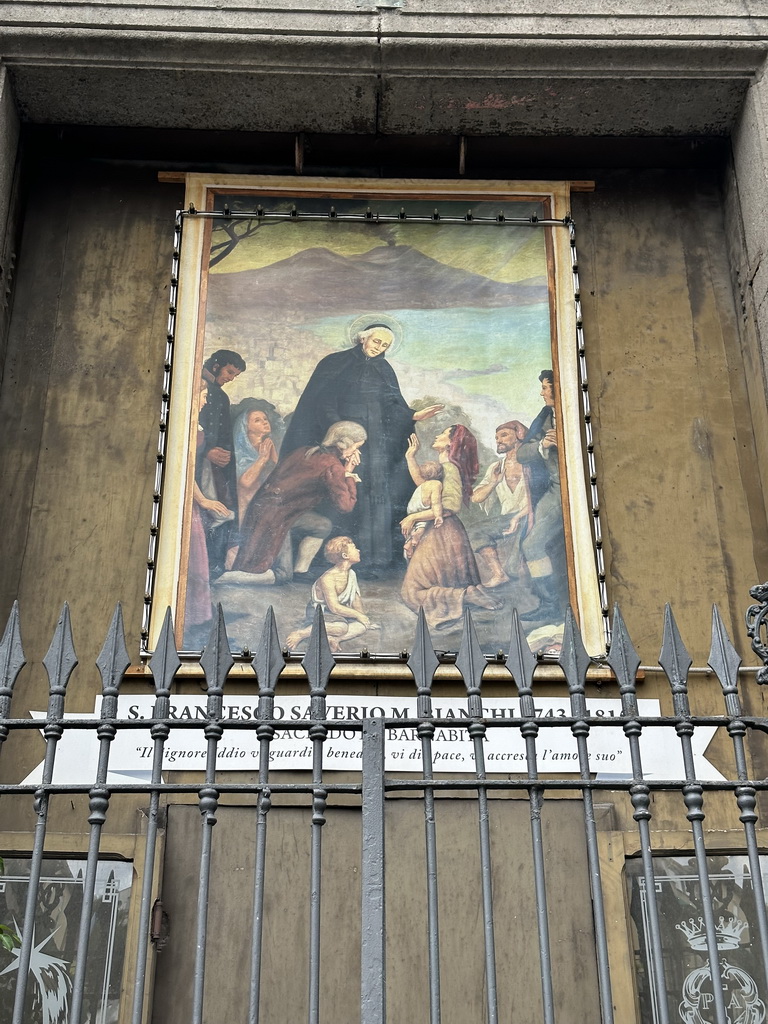 Painting of Francis Xavier Bianchi at the front of the Chiesa di Santa Maria di Caravaggio church at the Piazza Dante square