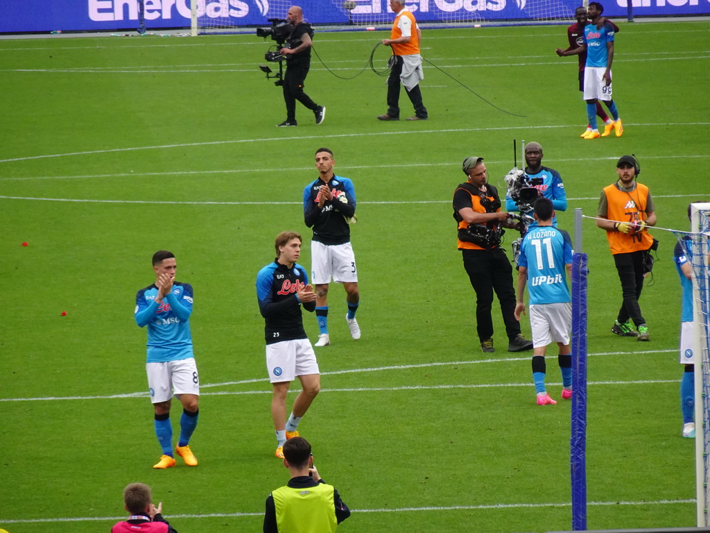 Players on the pitch thanking the crowd at the Stadio Diego Armando Maradona stadium, viewed from the Curva A Inferiore grandstand, right after the football match SSC Napoli - Salernitana