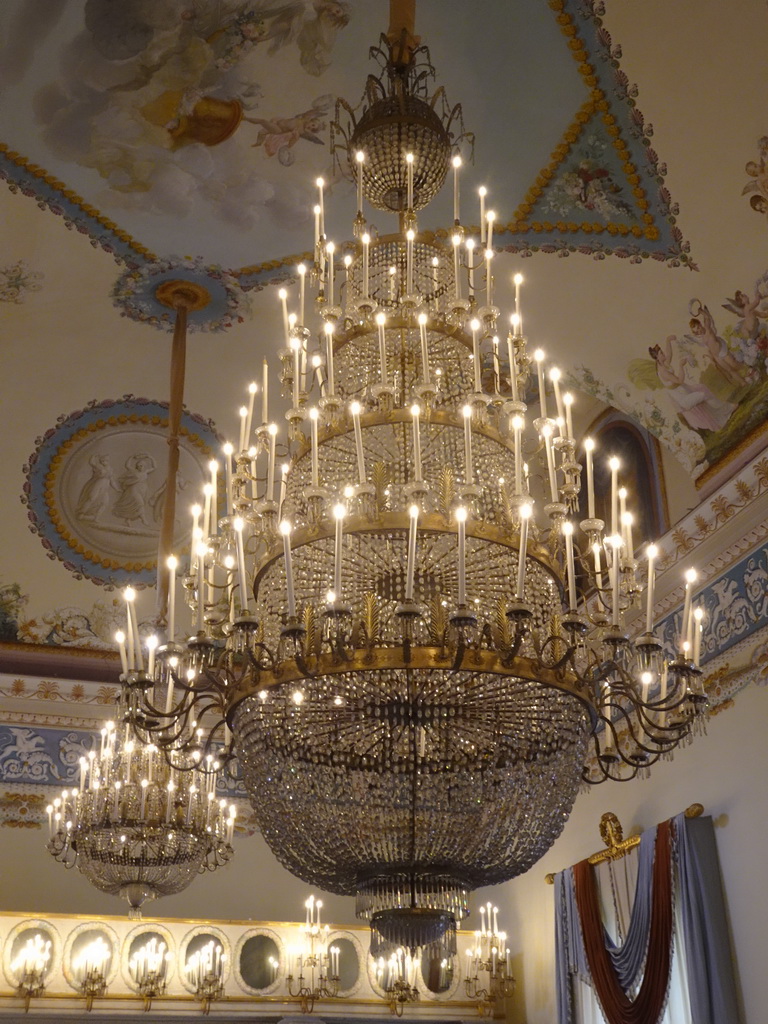 Chandeliers and frescoes on the ceiling of the Salone delle Feste room at the First Floor of the Museo di Capodimonte museum