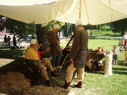 People in medieval clothes at the Kronenburgerpark, during the Gebroeders van Limburg Festival