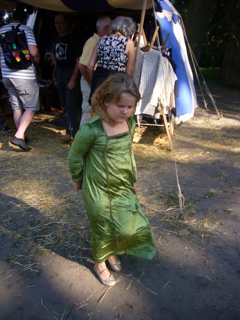 Child in medieval clothes at the Valkhof park, during the Gebroeders van Limburg Festival