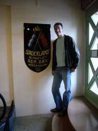 Tim with a coat of arms at the Velorama museum