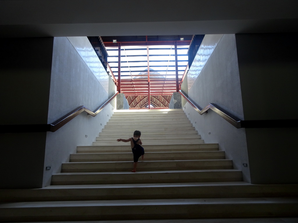 Max at the staircase at the lobby of the Inaya Putri Bali hotel