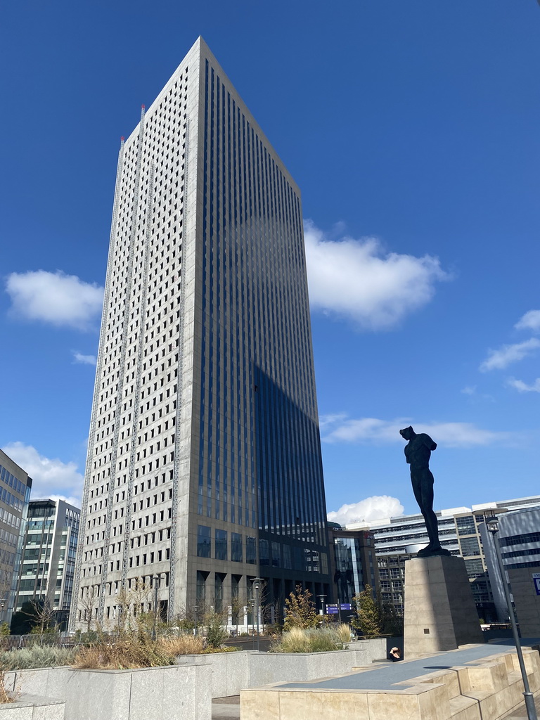 The Tour Egée tower and a statue at the Allée de l`Arche street