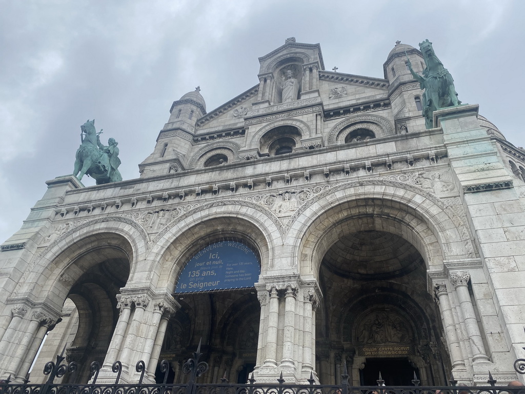 Facade of the Basilique du Sacré-Coeur church, viewed from the Parvis du Sacré-Coeur square