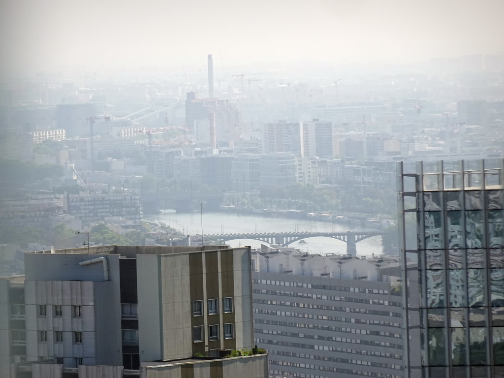 The Pont de Levallois and the Pont Ferroviaire d`Asnières bridges over the Seine river, viewed from the observation deck at the top floor of the Grande Arche de la Défense building