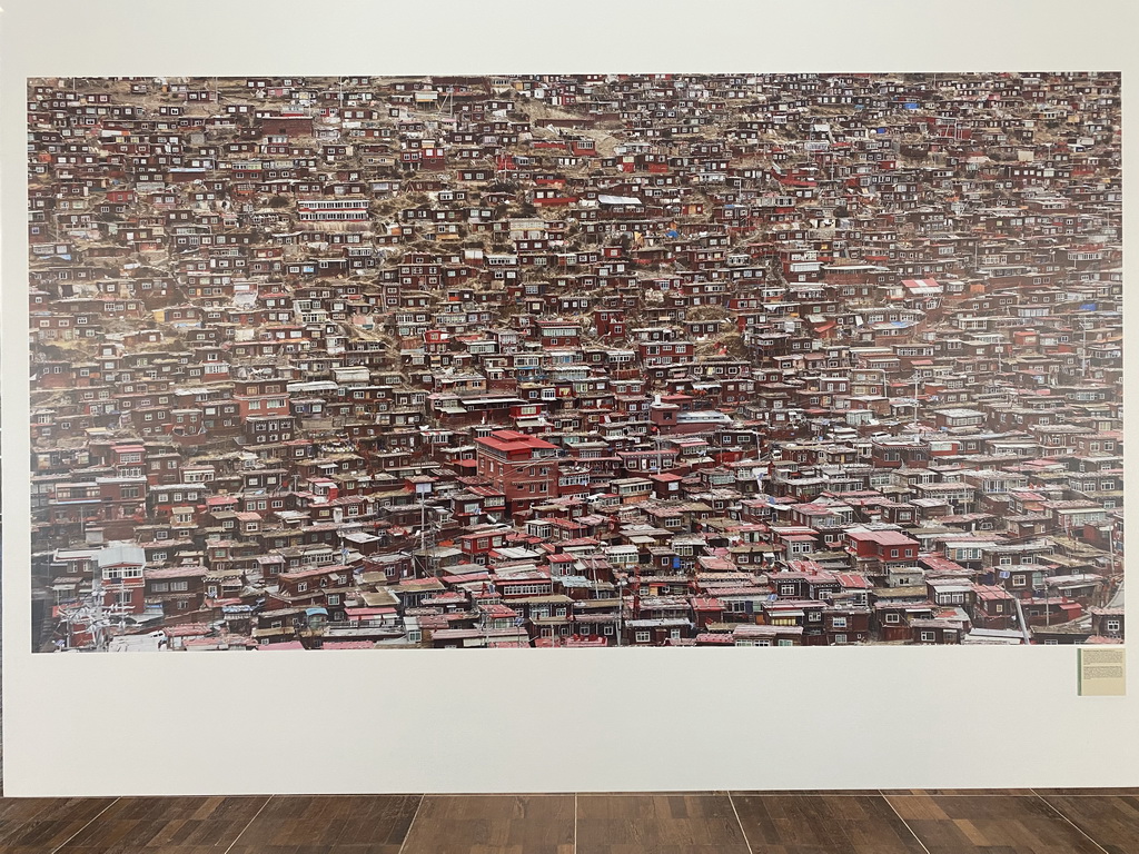 Photograph of houses in Kathmandu at the exhibition `Hymne à la Beauté` at the top floor of the Grande Arche de la Défense building