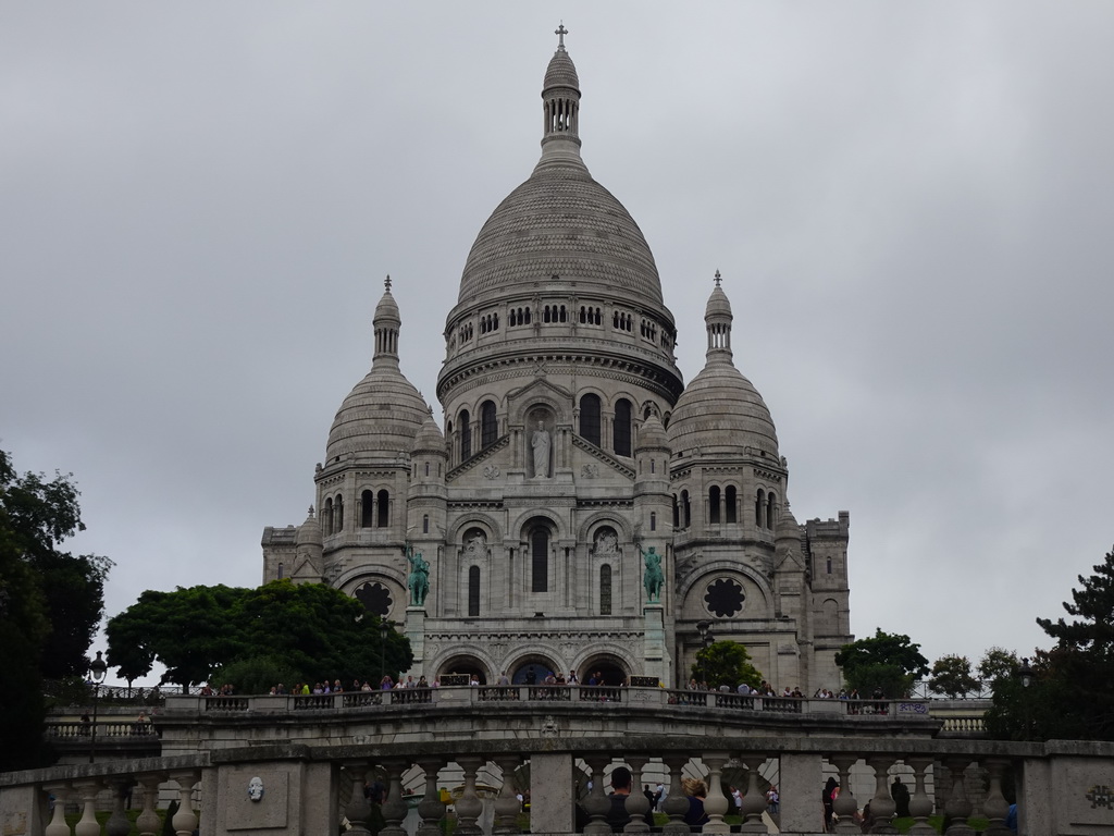 The Square Louise Michel and the front of the Basilique du Sacré-Coeur church, viewed from the Place Saint-Pierre square