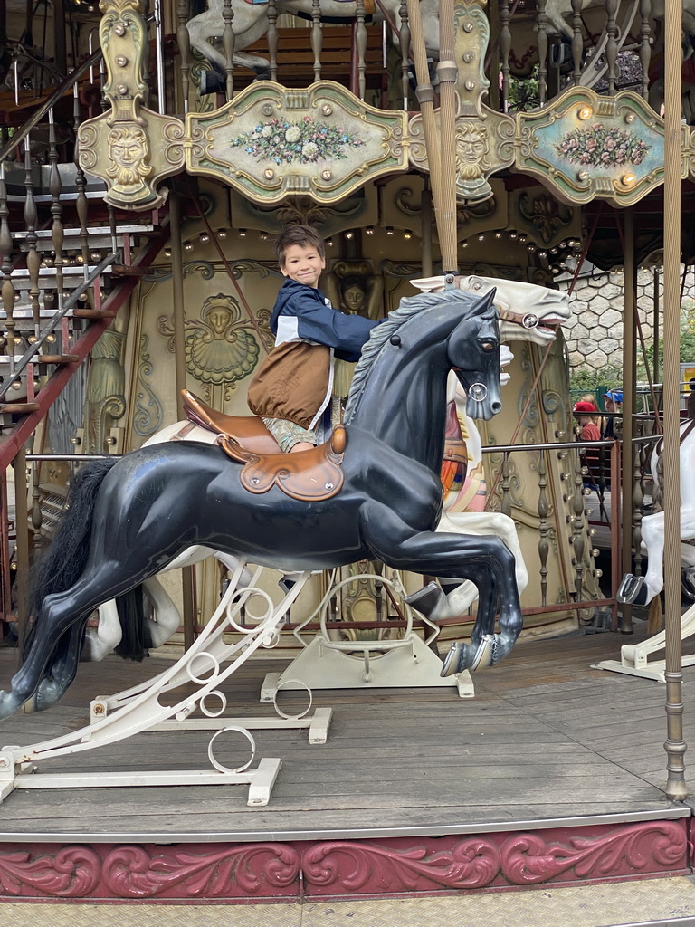 Max at the Carrousel de Saint-Pierre at the Place Saint-Pierre square