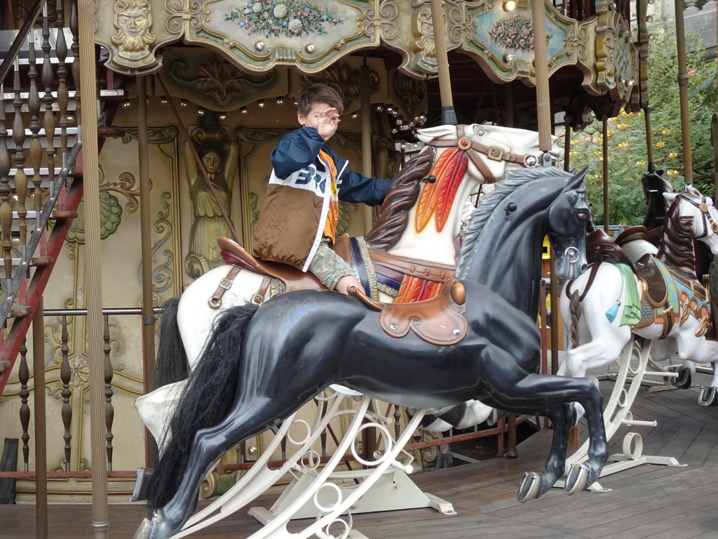 Max at the Carrousel de Saint-Pierre at the Place Saint-Pierre square